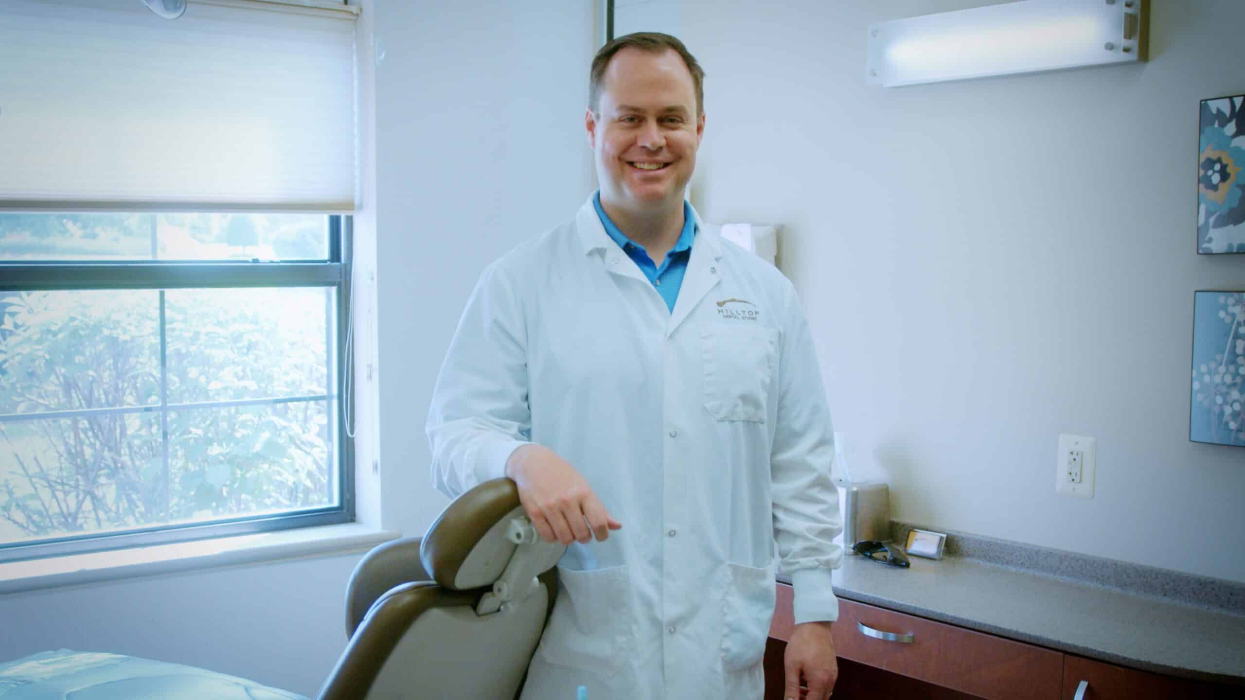 Dr. Haderlie dentist standing in operatory