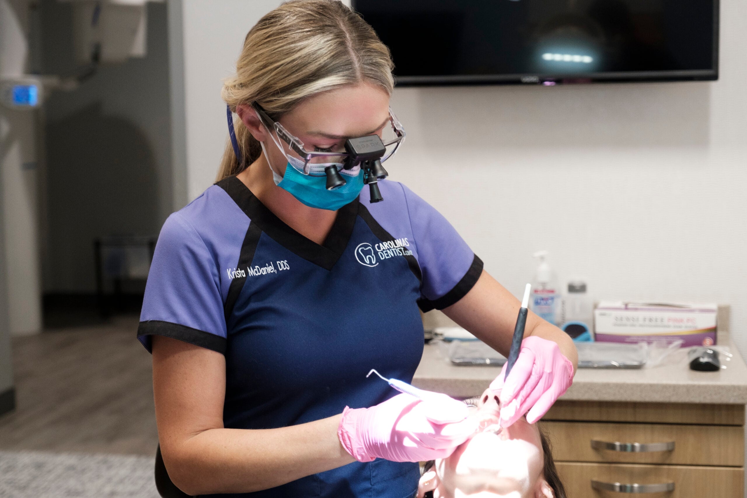 Dr. Krista McDaniel working on patient