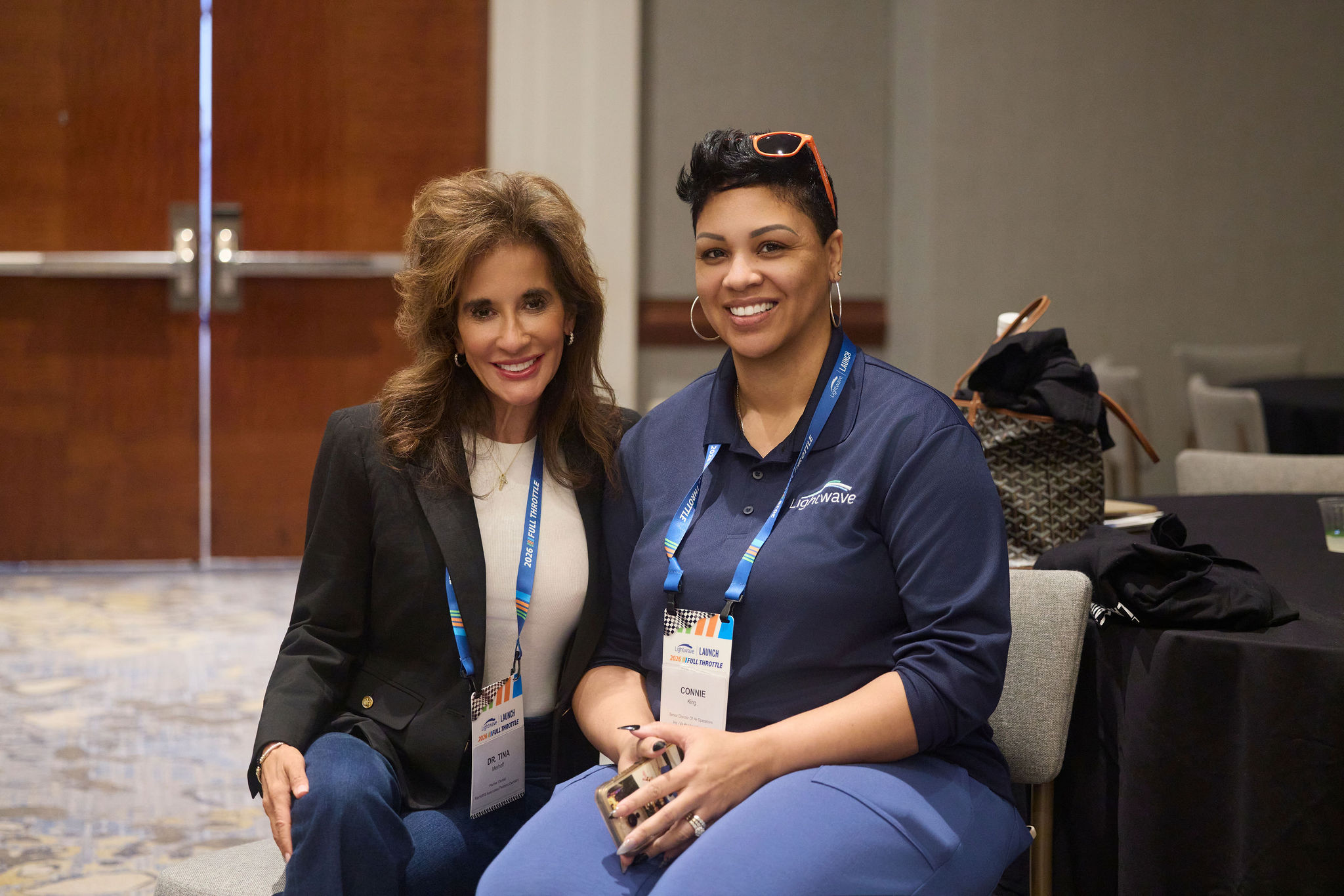 Two dental professionals at at Lightwave Launch event