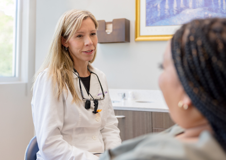 Doctor speaking with a patient